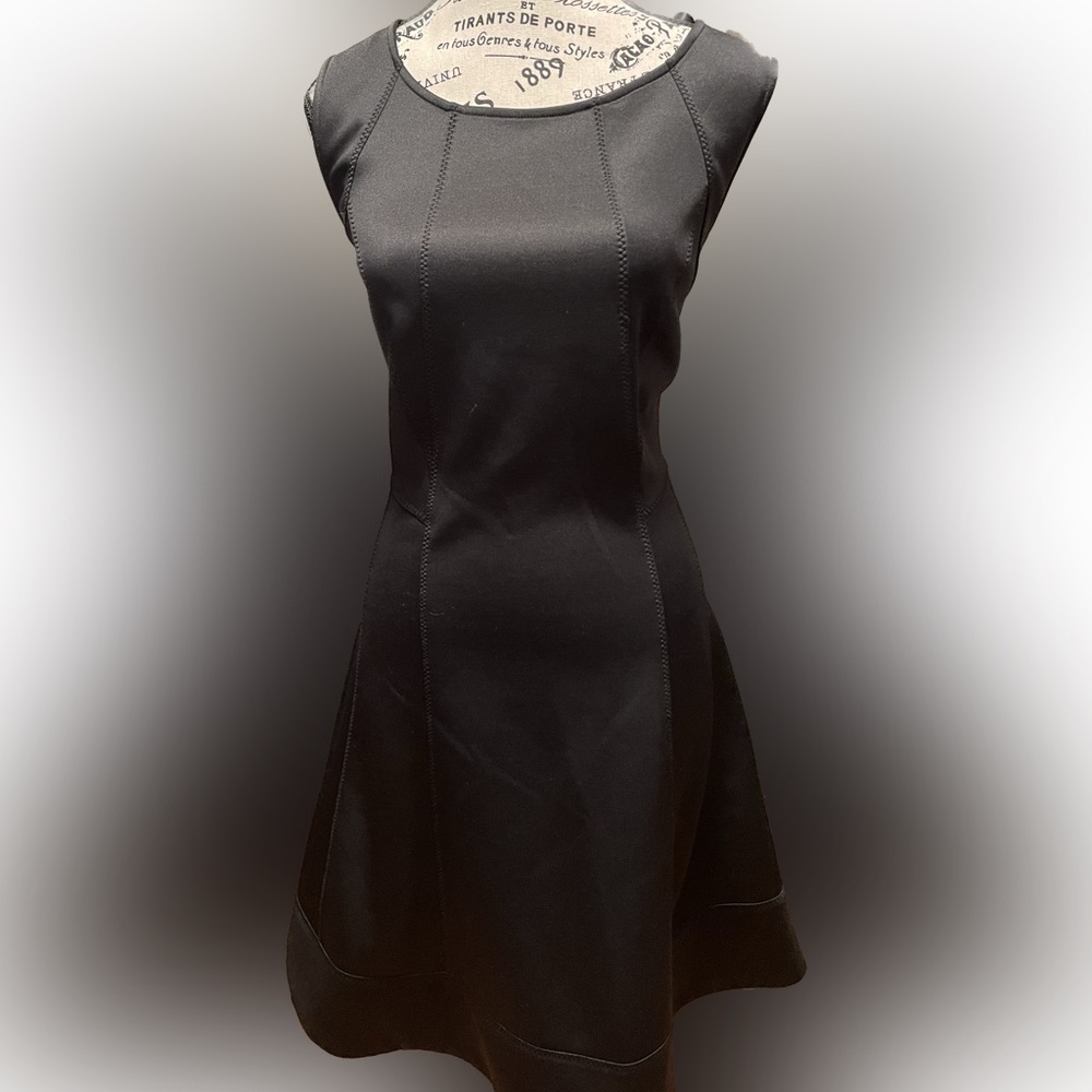Women’s Sharagano sleeveless black dress, size 14. Thick easy care material.